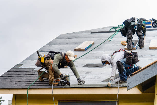 Professional Gutter Installation technician working in Weymouth, MA